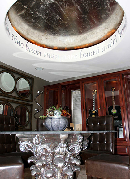 Metallic faux finish ceiling dome with text on the ring